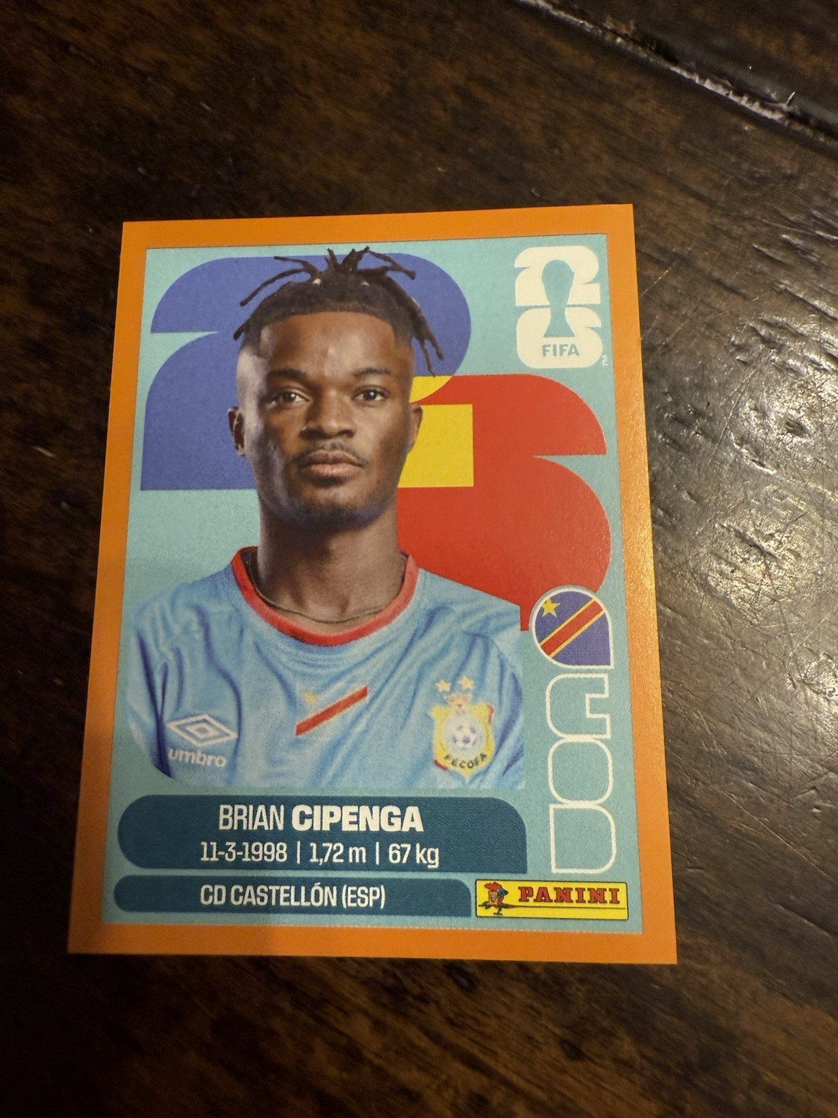 2026 Panini FIFA World Cup Sticker Brian Cipenga #COD 17 – Congo DR Orange