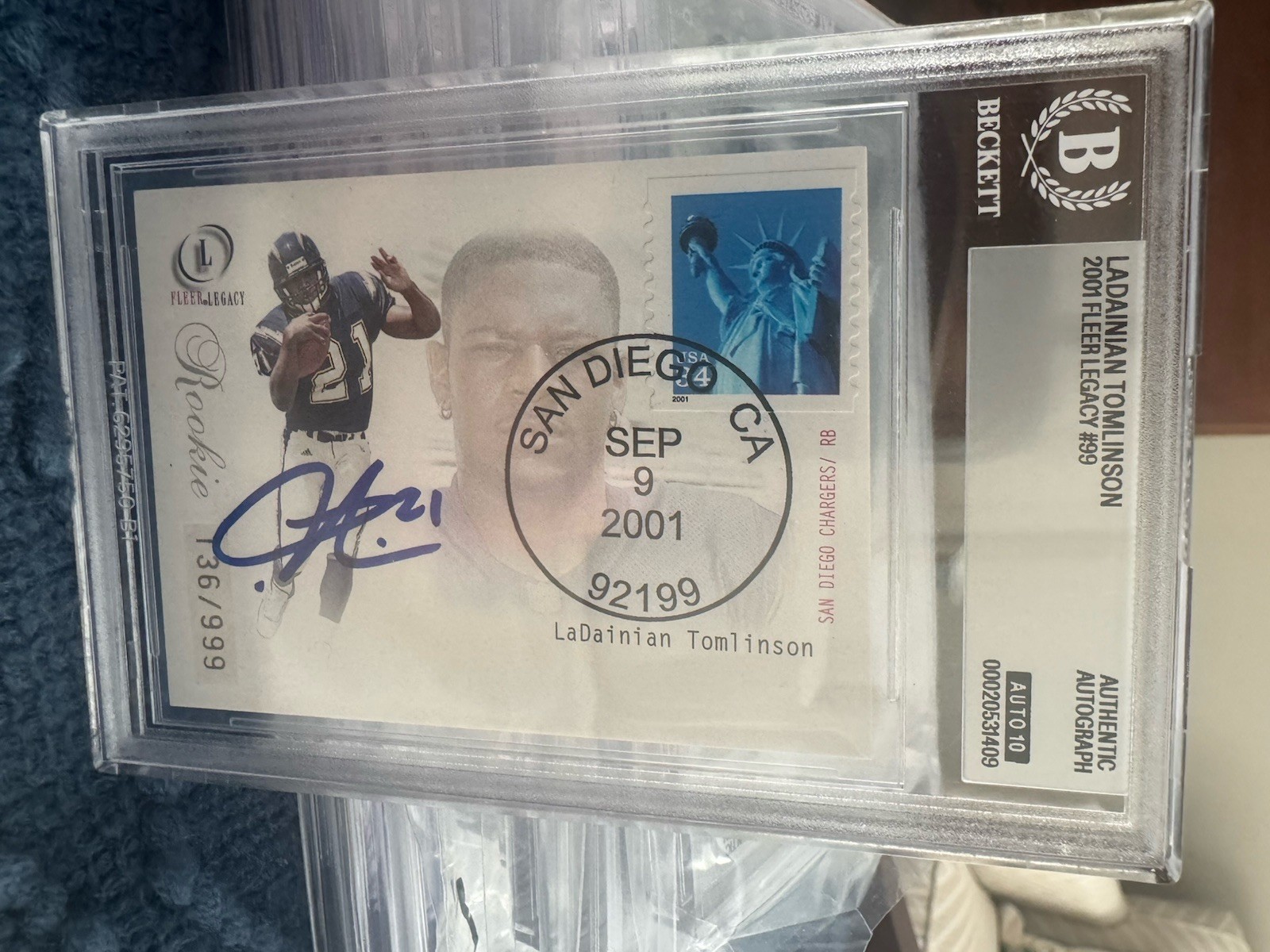 LADAINIAN TOMLINSON 2001 Fleer Legacy 136/999 Autographed Signed AUTO 10 BAS COA
