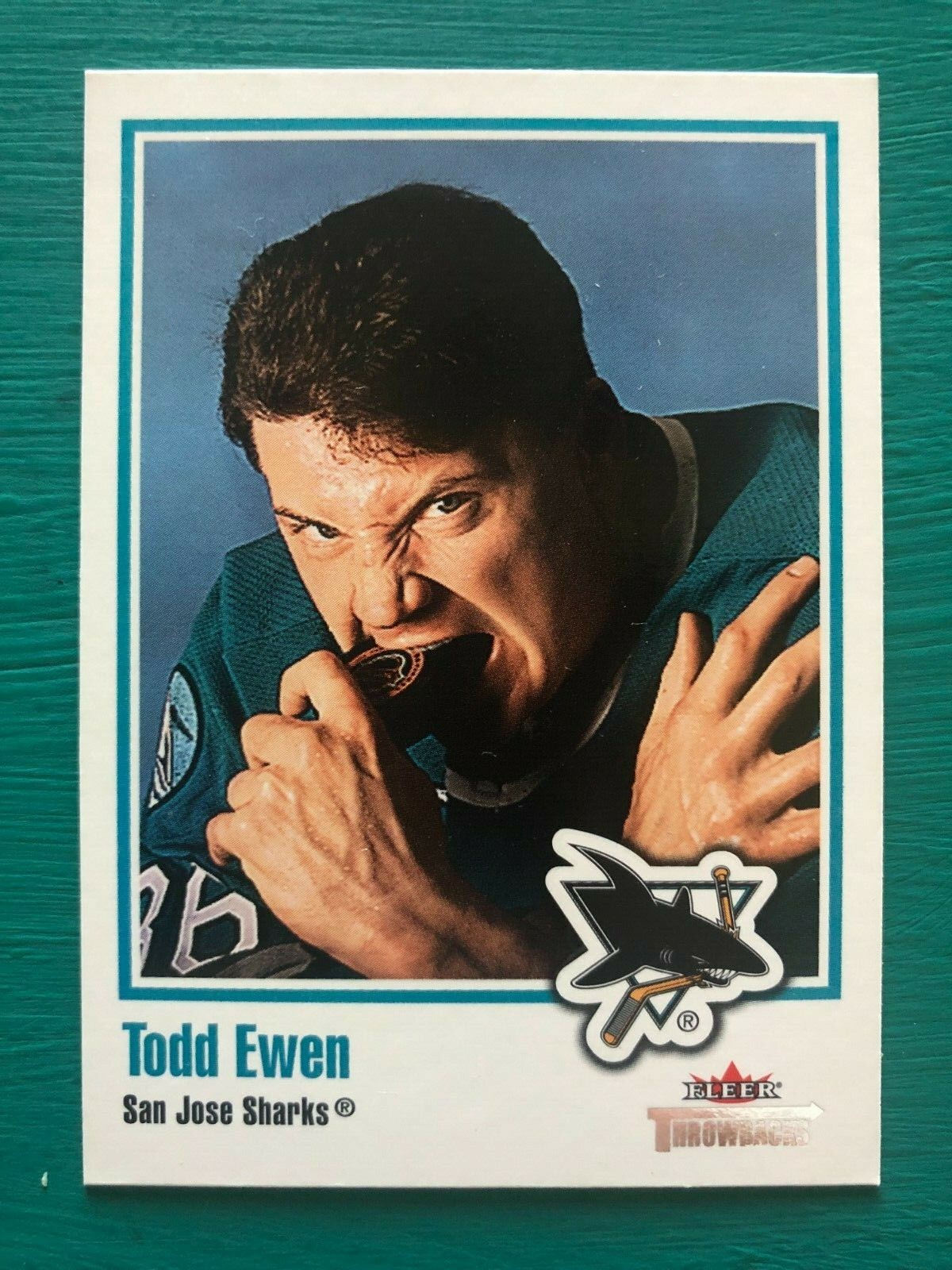 2002-03 Fleer TODD EWEN Sharks “Biting Hockey Puck” Funny Real Ice Hockey Card