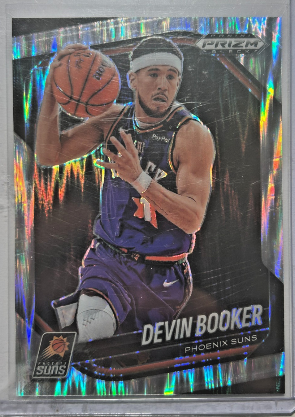 Devin Booker #/249 Prizm Black Skewed 2024-25 Panini Numbered Parallel SP #11