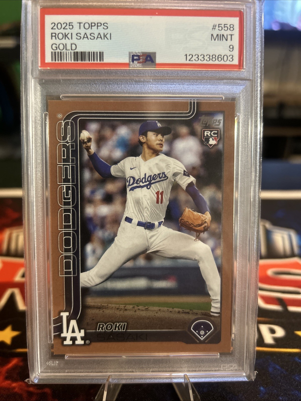 2025 Topps Series 2 – Rookie Debut Roki Sasaki #558 Gold /2025 (RC) PSA 9