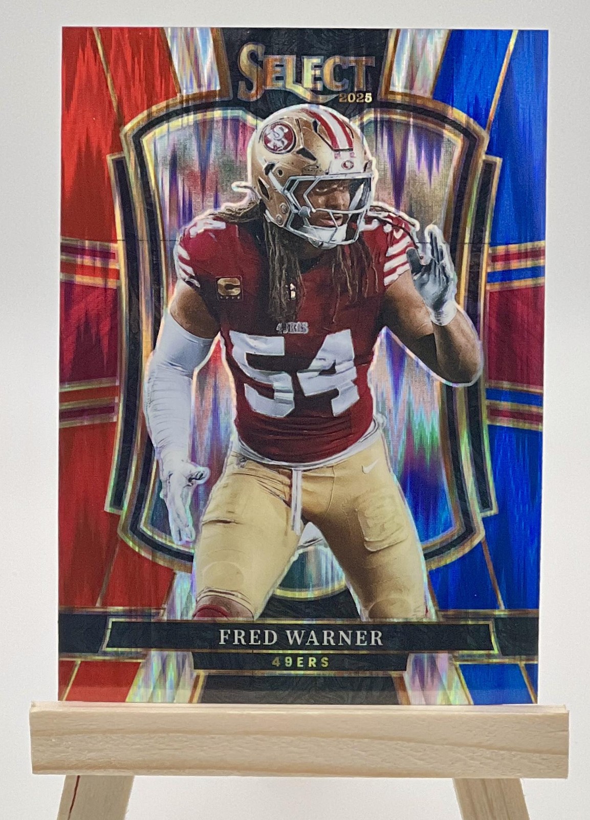 2025 Panini Select #118 Fred Warner Red and Blue Prizm Shock
